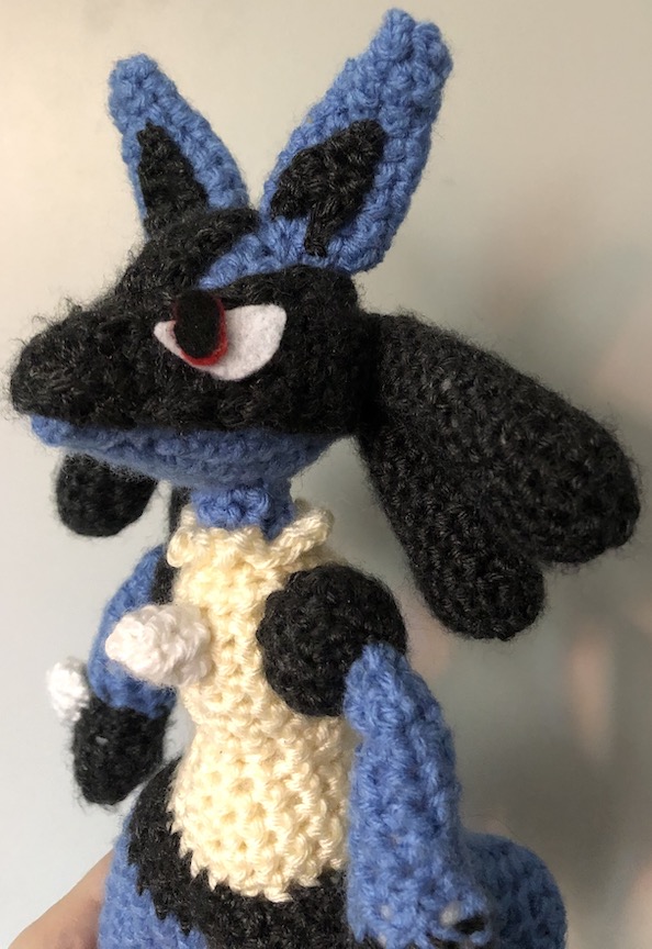 Crocheted lucario at an angle and closer up