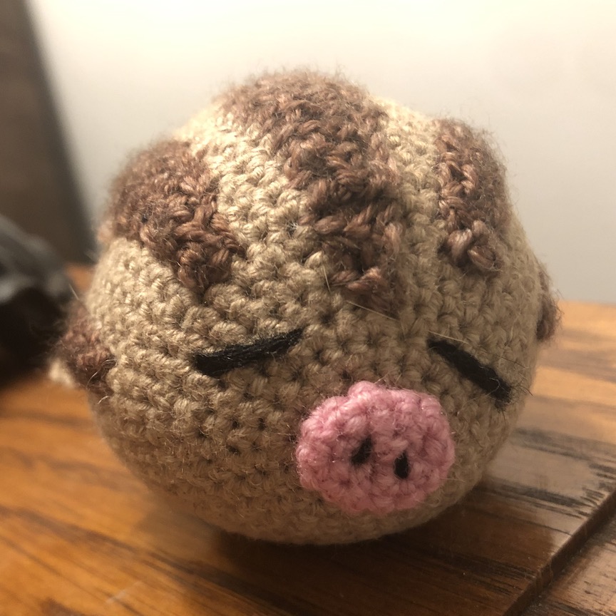 Larger crocheted swinub with smaller yarn facing you
