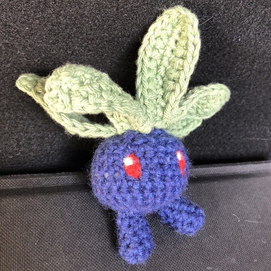 Crocheted oddish with needle felted eyes