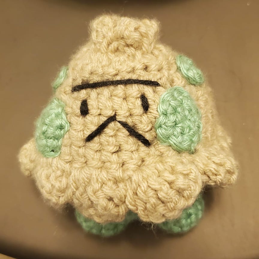 Crocheted shroomish facing you