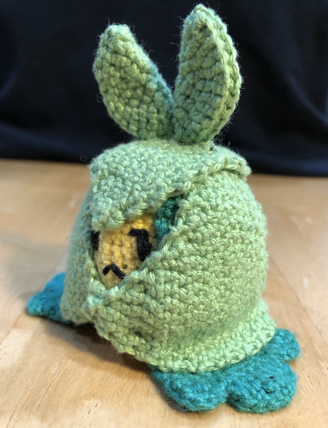 crocheted swadloon from an angle