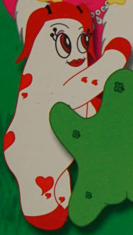Screenshot from the book of Love Star in profile. She's white with red hearts all over, red pig tails, and delightful little orbs at the end of her eyelashes.
