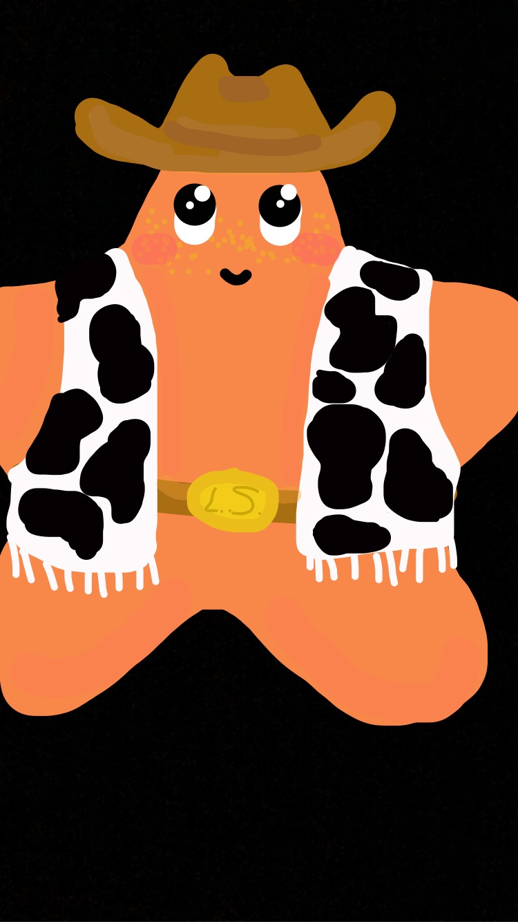 Orange Lone Star wearing a cowboy hat, his iconic belt with the gold 'LS' belt buckle, and a fringed cow print vest. He smiling and looking up and has faint freckles